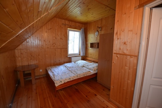 Sypialnia w domu letniskowym dla 6 - 10 osób w Pobierowie